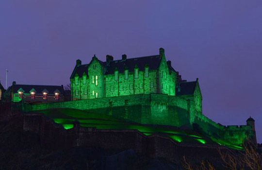 Edinburgh Castle going green for St Patricks Day 2015. Credit: Historic Scotland