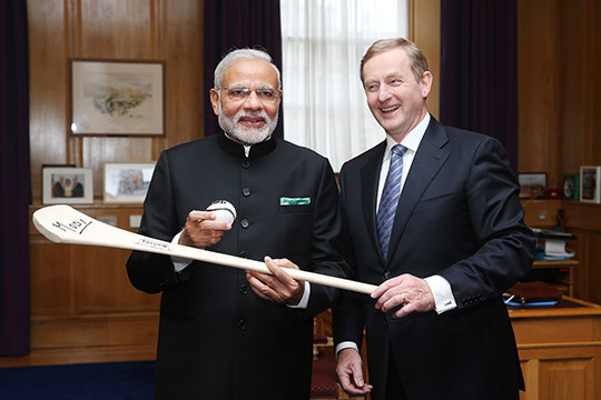 Prime Minister Narendra Modi of India at Government buildings with Taoiseach Enda Kenny being presesnted with a hurl and sliotar. Photo: Maxwells Dublin