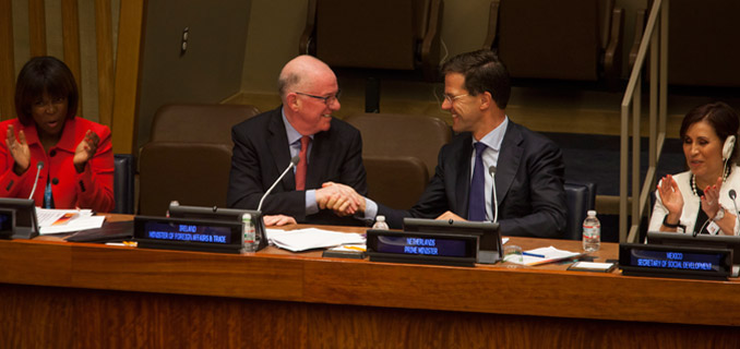 Charles Flanagan, left of center, Minister for Foreign Affairs and Trade, Ireland, shakes hands with Mark Rutte, right of center, Prime Minister of the Netherlands, at the Delivering Zero Hunger, at the United Nations in New York, U.S., on Thursday, September 25, 2014.  Photograph by Michael Nagle