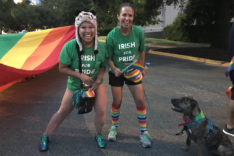 Members of the Celtic Cowboys GAA Club and "Storm" the dog marching with the "Irish for Pride" group at Austin Pride 2018.