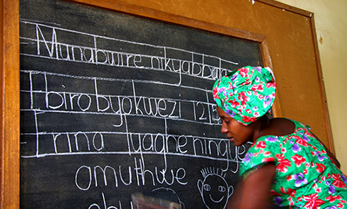 Edith teaching children in their local language
